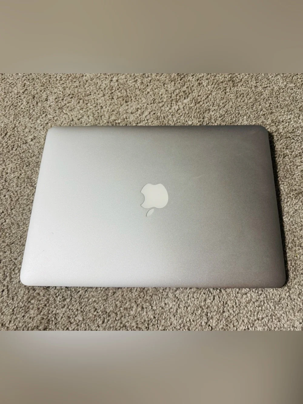 Apple Silver MacBook Laptop with Apple Logo